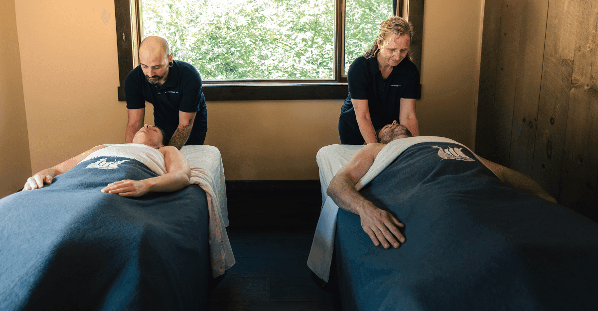 Couple receiving a duo massage at Scandinave Spa Mont-Tremblant.