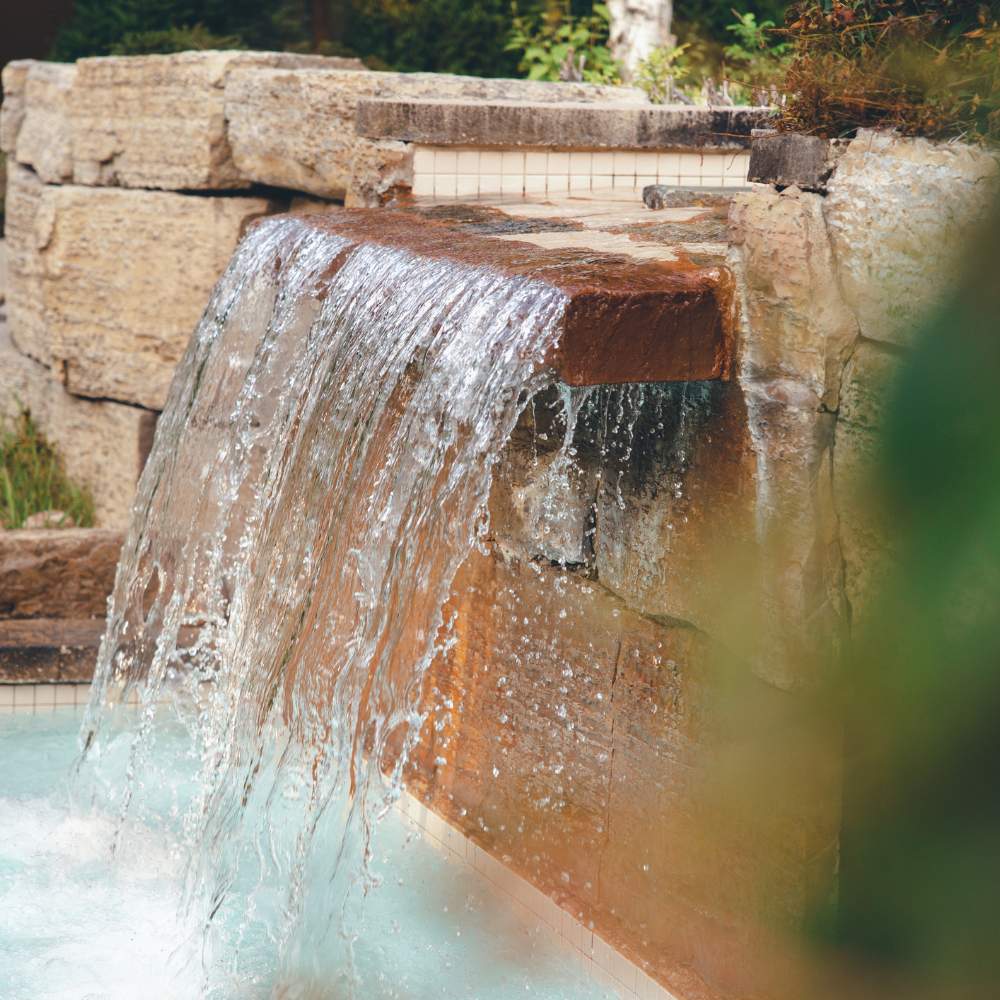 Thermal spa waterfall at Scandinave Spa